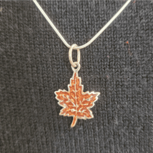 Maple leaf pendant on snake chain