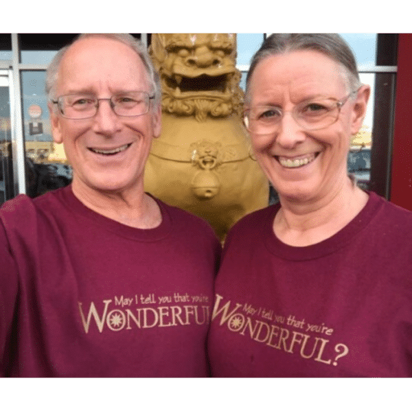 Couple wearing Wonderful T-shirts