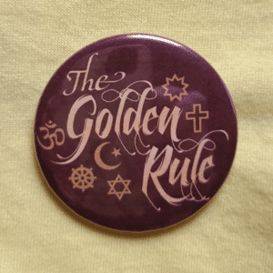 Golden Rule button on yellow shirt