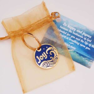 Sea of Joy Gold-plated keyring comes in an organza pouch with a gift card