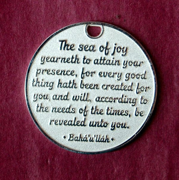 Back of silver-plated Sea of Joy Medallion