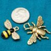 Bee Kind Charms showing size with dime
